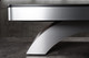 Close-up detail of the Poshy Rainbow pool table base, showing brushed metallic construction with rainbow gradient finish and modern curvature, designed by Doc & Holliday. Close-up detail of the Poshy Rainbow pool table base, showing brushed metallic construction with rainbow gradient finish and modern curvature, designed by Doc & Holliday.